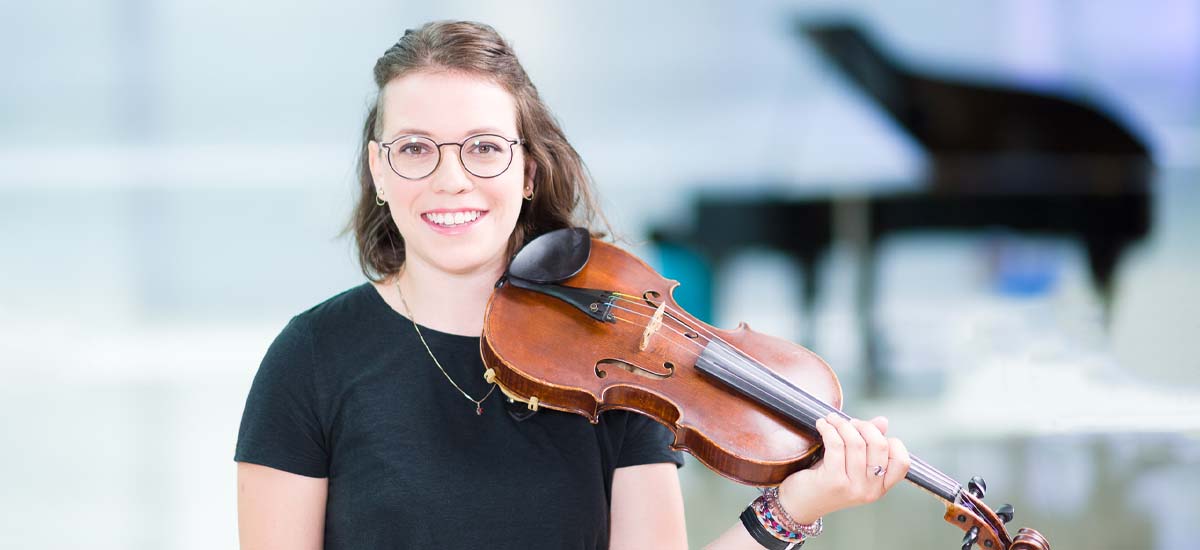 Student with their Violin