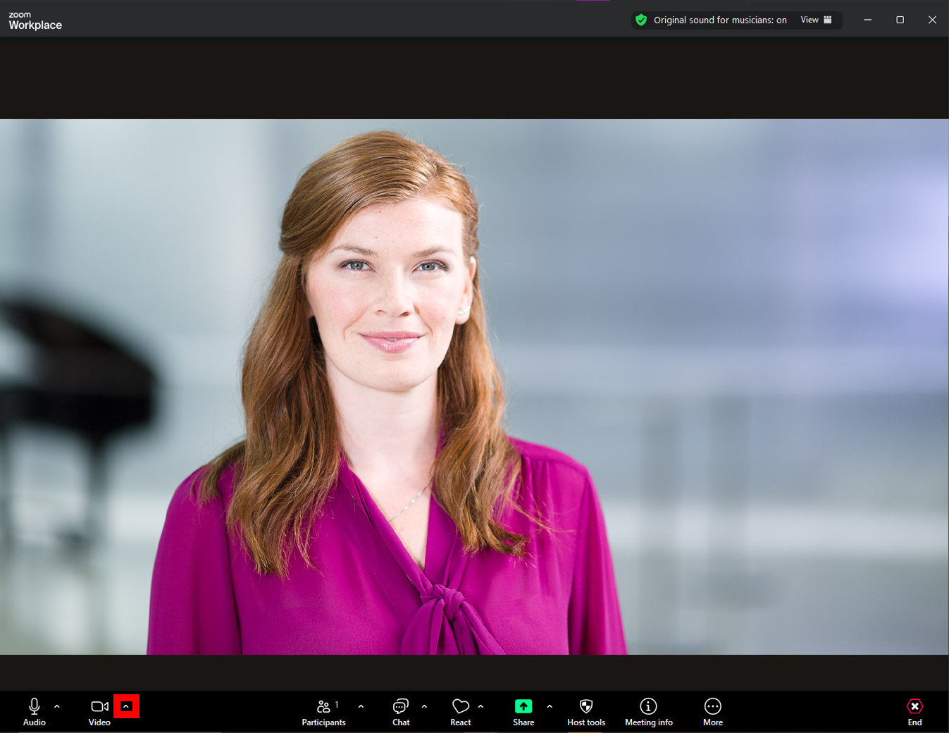 Screenshot highlighting the menu arrow in Zoom